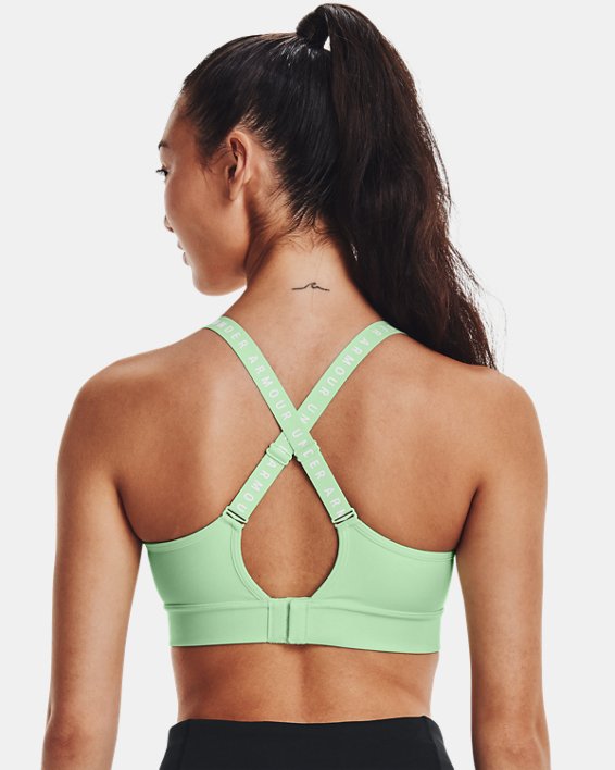 Women's UA Infinity Mid Covered Sports Bra in Green image number 1